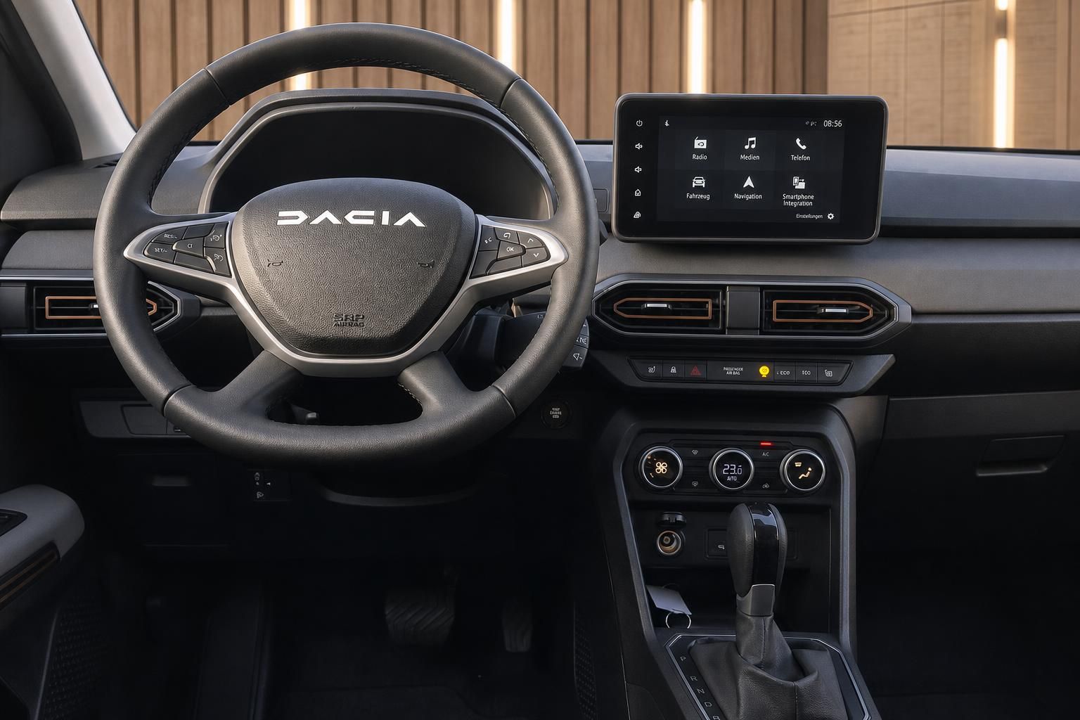 Dacia Innenraum mit modernem Cockpit - Lenkrad, Touchscreen und zentrale Bedienelemente
