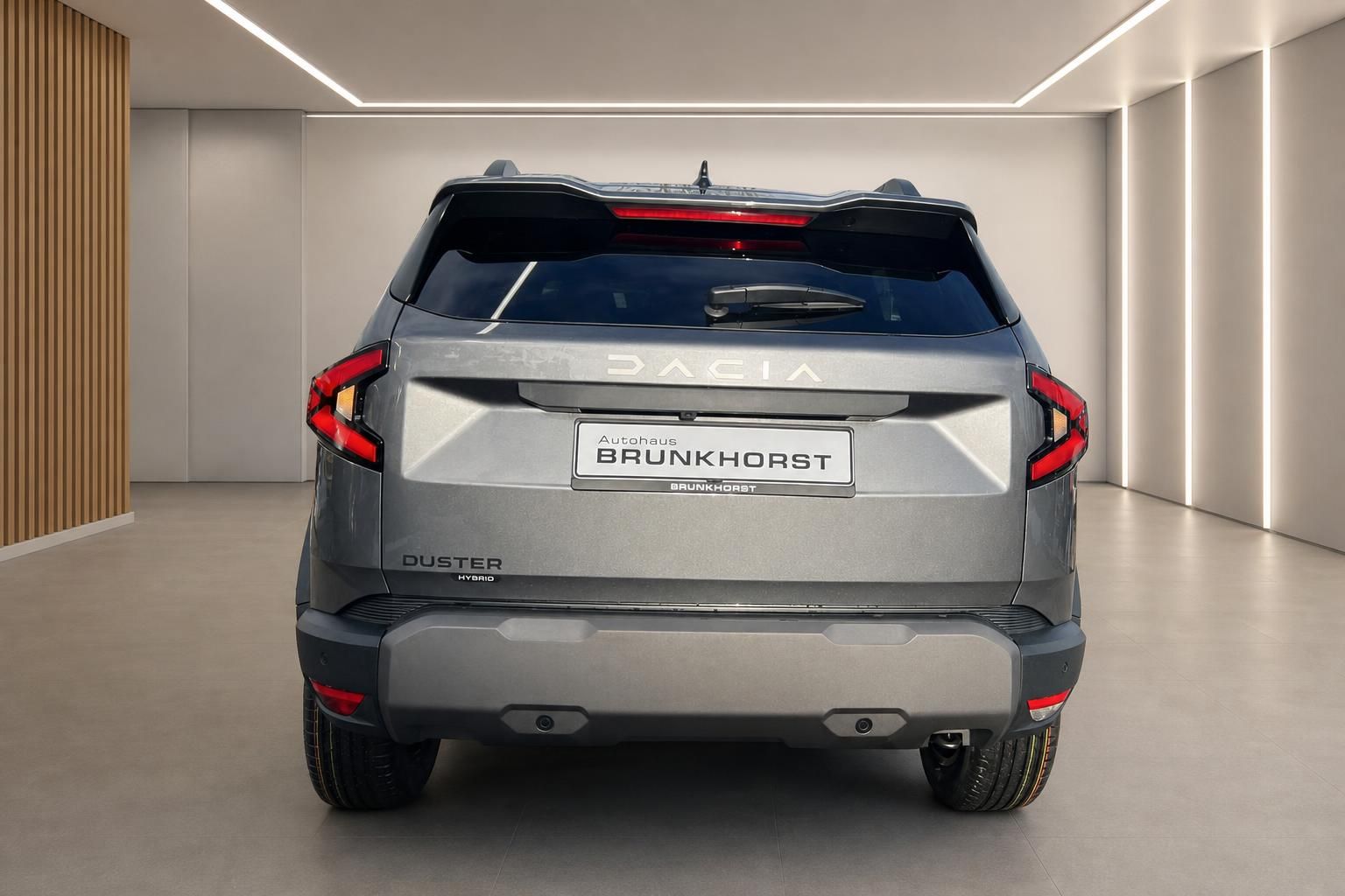Dacia Duster Hybrid - Heckansicht in silber/grau, modernes SUV-Design mit LED-Rückleuchten