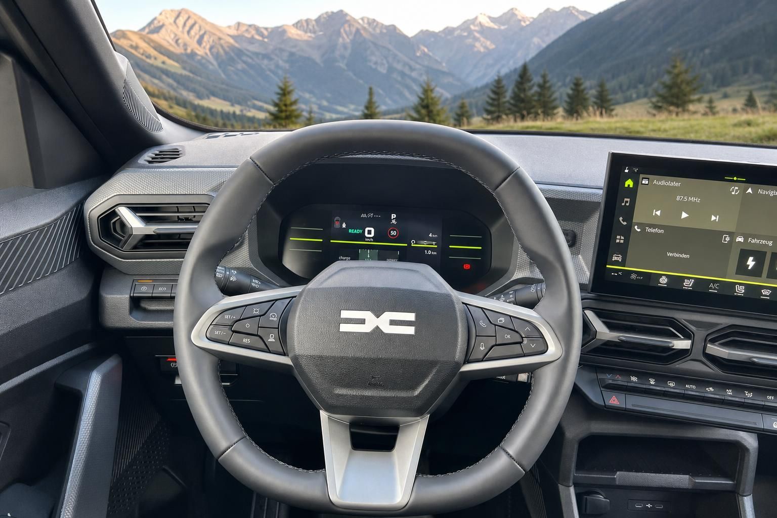 Fahrzeug Innenraum mit digitalem Cockpit und Lenkrad mit Bergpanorama im Hintergrund