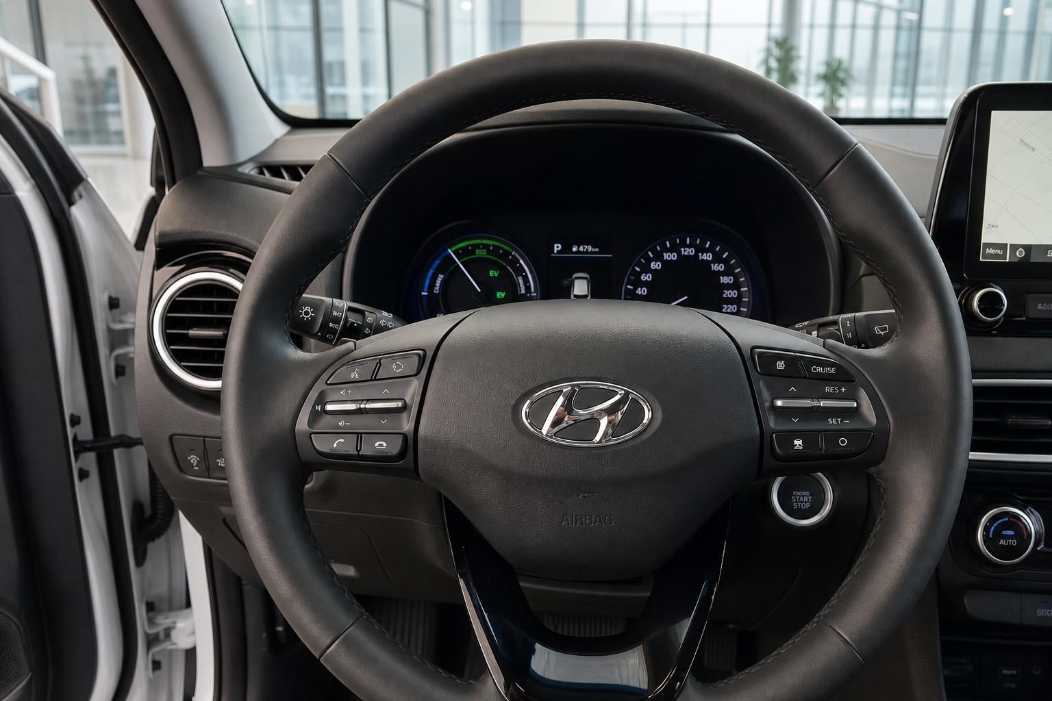 Hyundai Kona Hybrid Lenkrad mit Multifunktionstasten und digitales Kombiinstrument Innenansicht