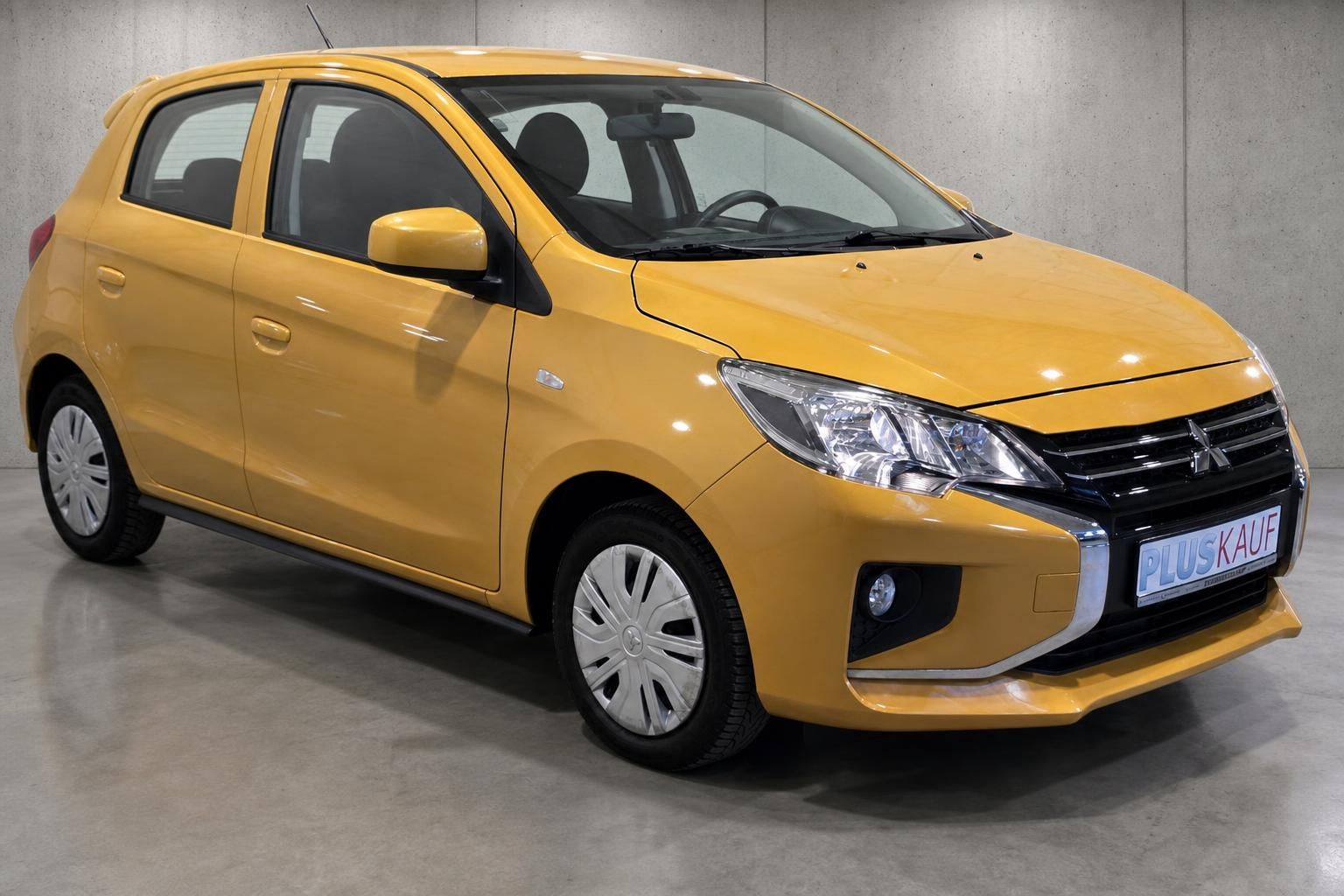 Mitsubishi Space Star gelb, Seitenansicht vorne, Kleinwagen