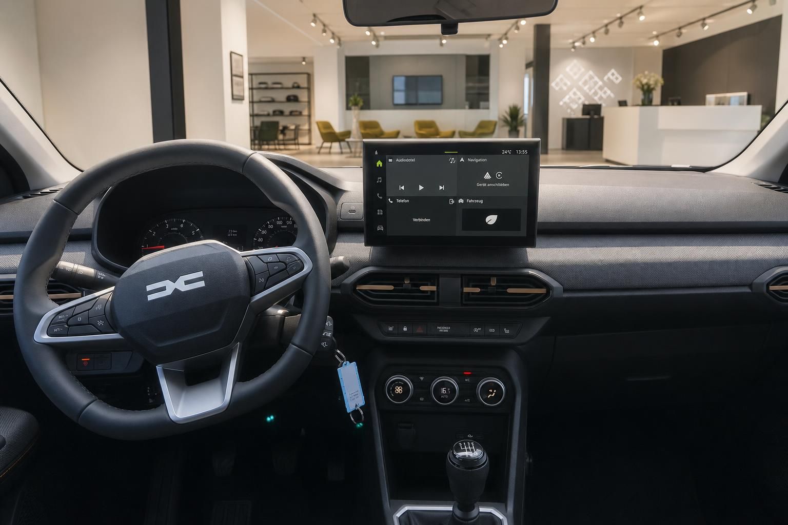 Cockpit mit Lenkrad und Infotainment-Display im Fahrzeug