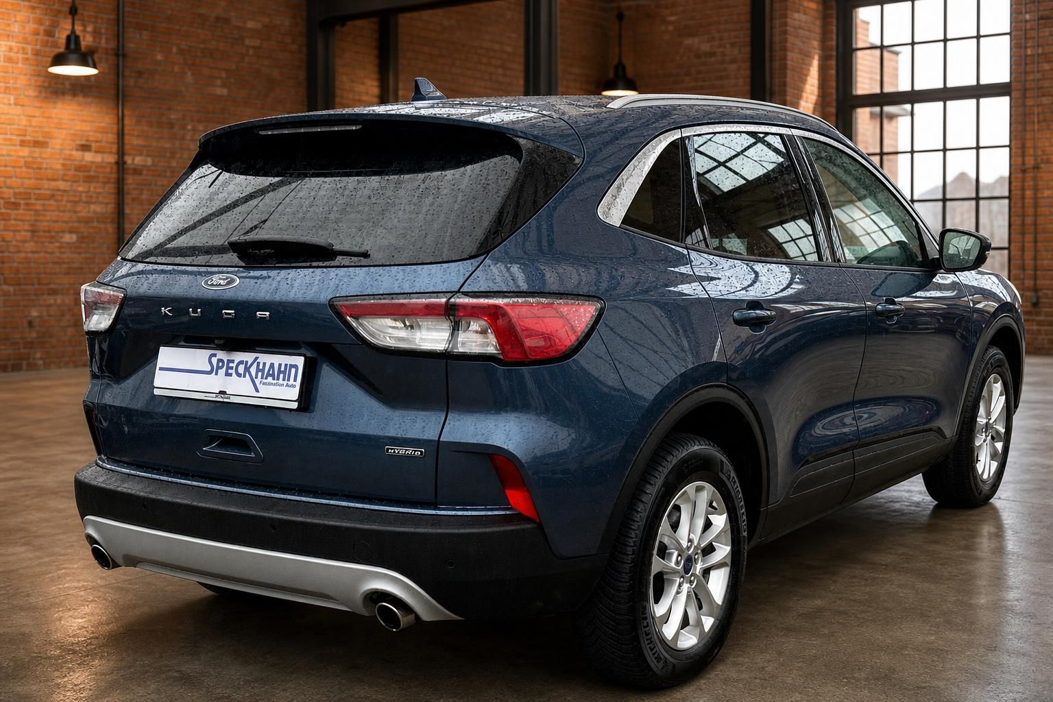 Ford Kuga Hybrid blau Heck schräg links – Gebrauchtwagen SUV Autohaus Speckhahn