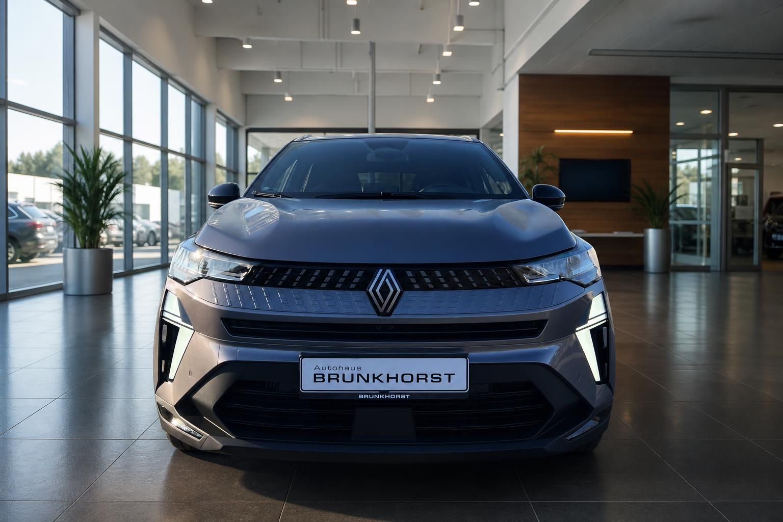 Renault Captur Frontansicht grau metallic mit LED-Scheinwerfern im Autohaus