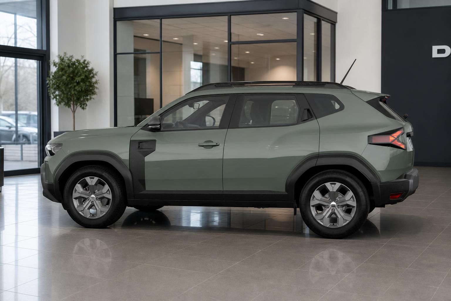 Dacia Duster gruen, Seitenansicht Fahrerseite im Showroom