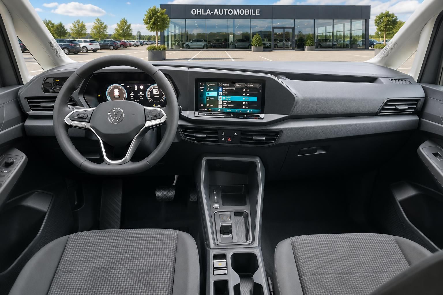 Cockpit und Armaturenbrett eines VW Caddy mit Lenkrad und Touchscreen