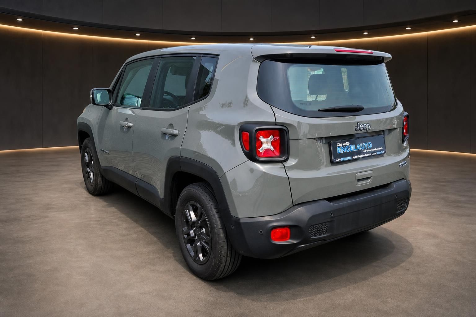 Jeep Renegade grau Heck-Seitenansicht im Showroom
