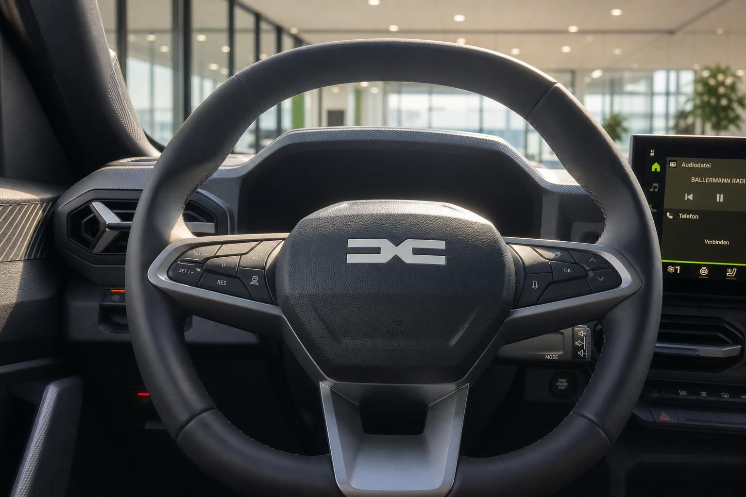 Fahrzeug Cockpit Lenkrad mit Multifunktionstasten und Infotainment-Display