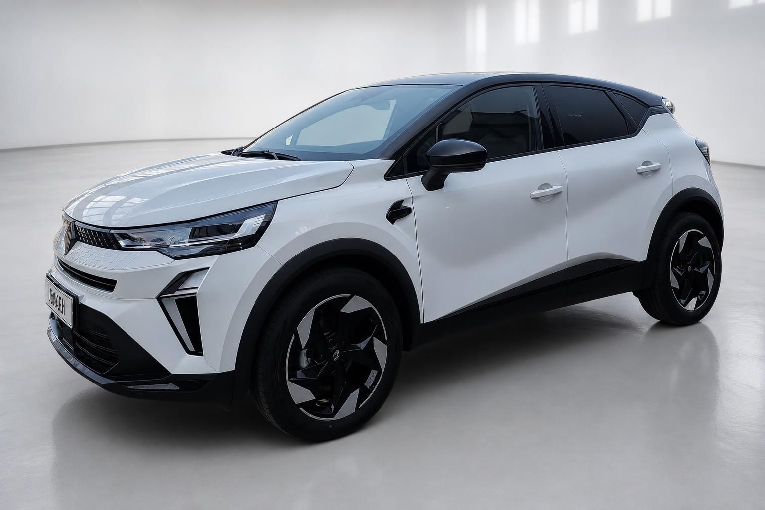 Renault Captur weiss Frontansicht schraeg mit schwarzem Dach