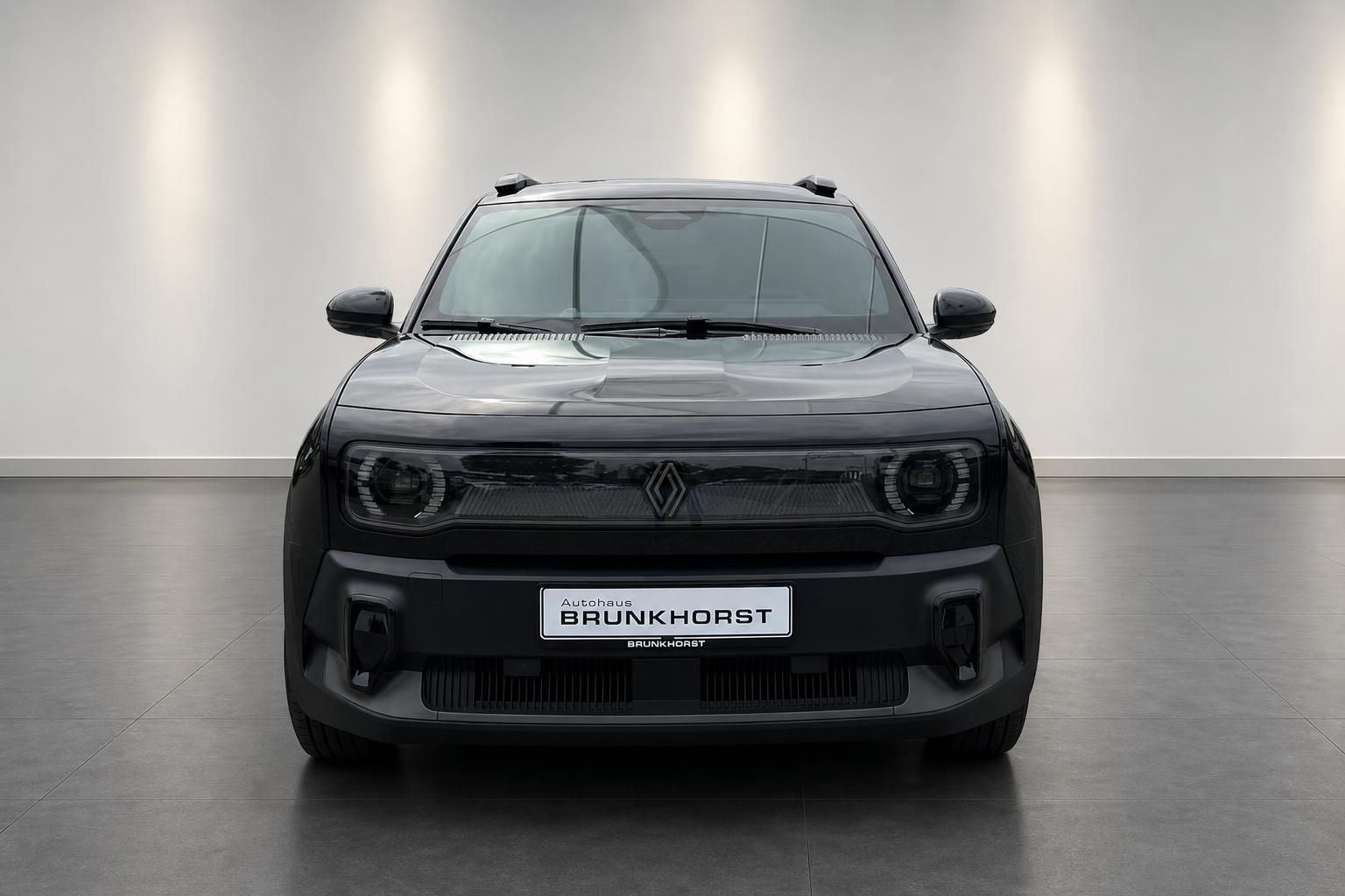 Renault 4 in Schwarz, direkte Frontansicht mit Kuehlergrill