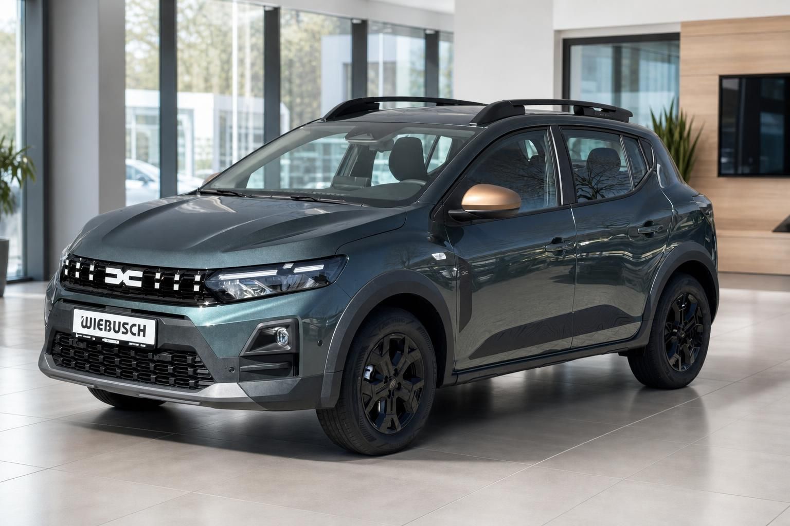 Dacia SUV in graugrün im Autohaus Showroom mit schwarzen Felgen und Dachgepäckträger