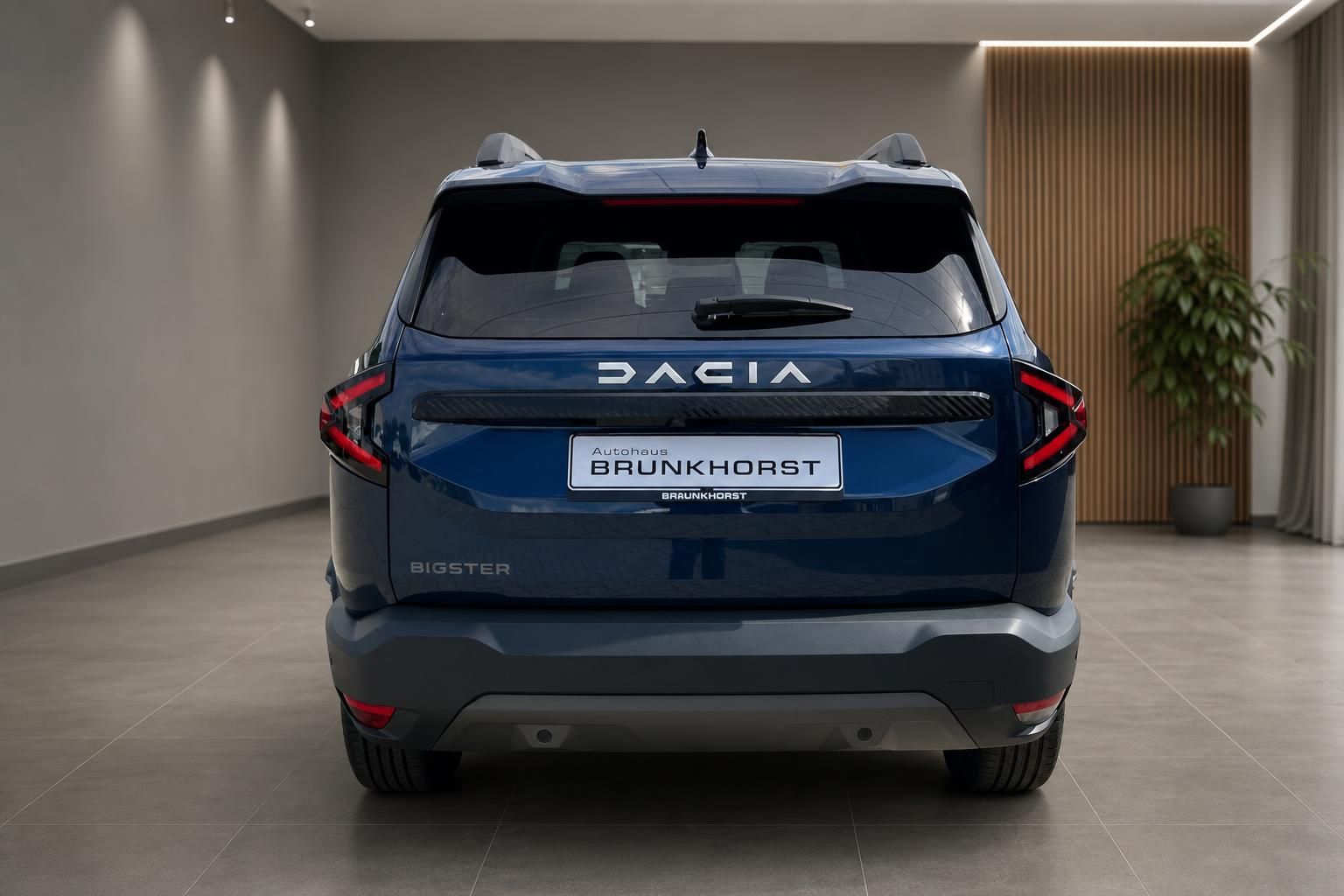 Dacia Bigster SUV Heckansicht - Rücklichter und moderne Fahrzeugsilhouette in blau