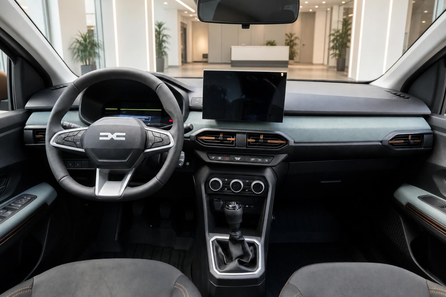 Cockpit mit Lenkrad, Digitaldisplay und Mittelkonsole im Fahrzeug