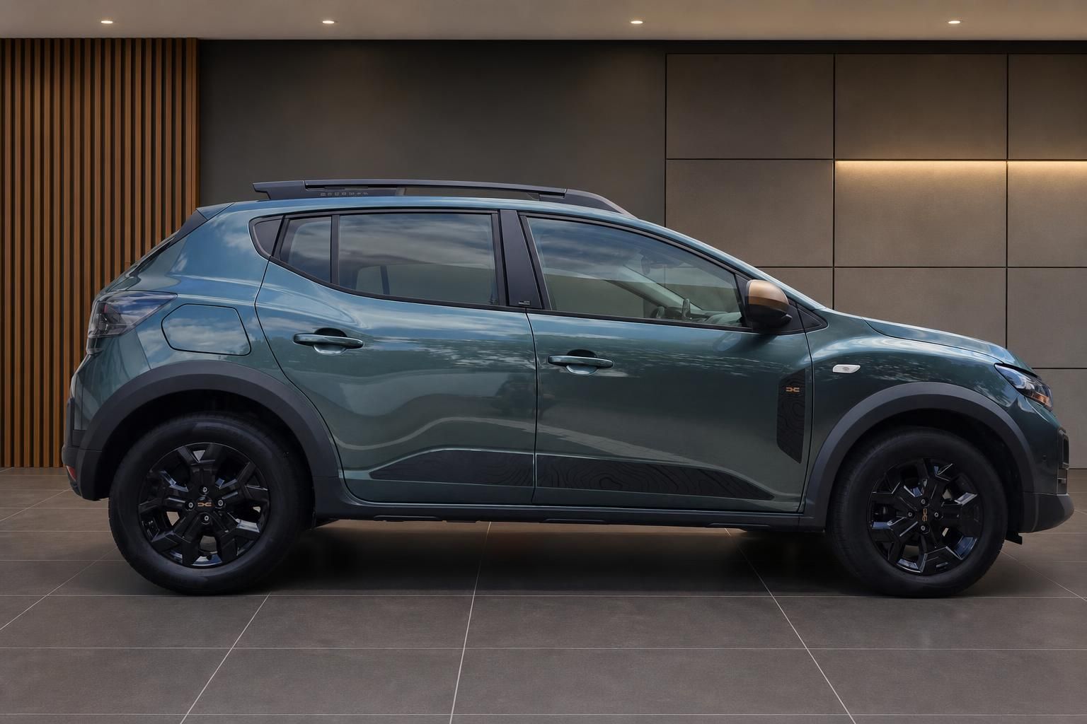 Dacia SUV Seitenansicht in Grün mit schwarzen Felgen