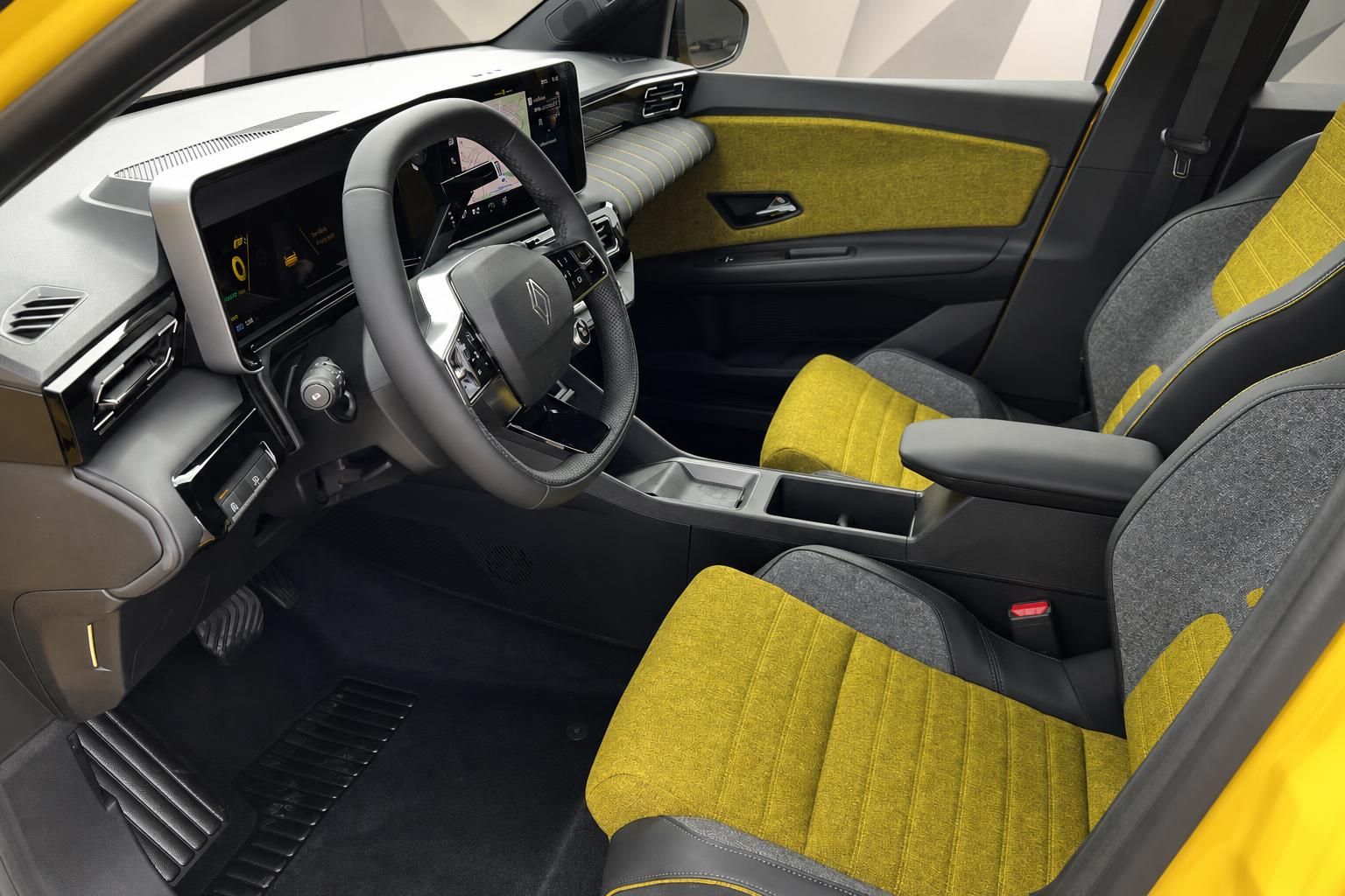Renault 5 E-Tech Electric Innenraum Fahrersitz gelb-grau Cockpit und Lenkrad