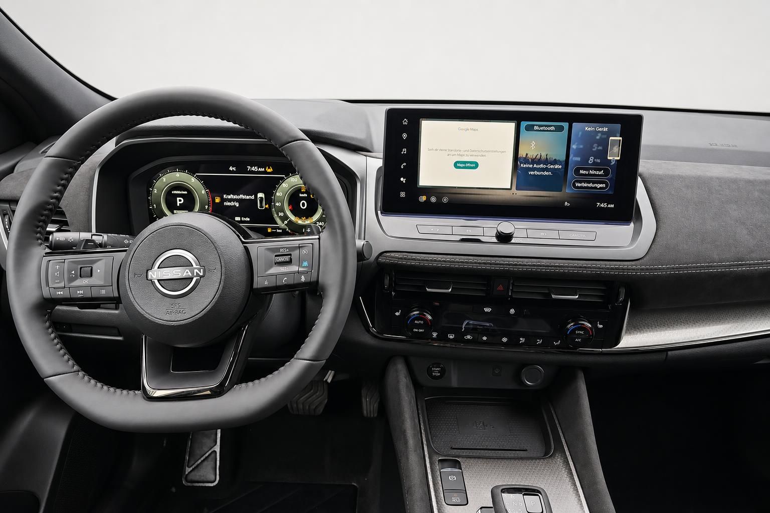 Nissan Cockpit mit Lenkrad, Digitaltacho und Touchscreen-Infotainment
