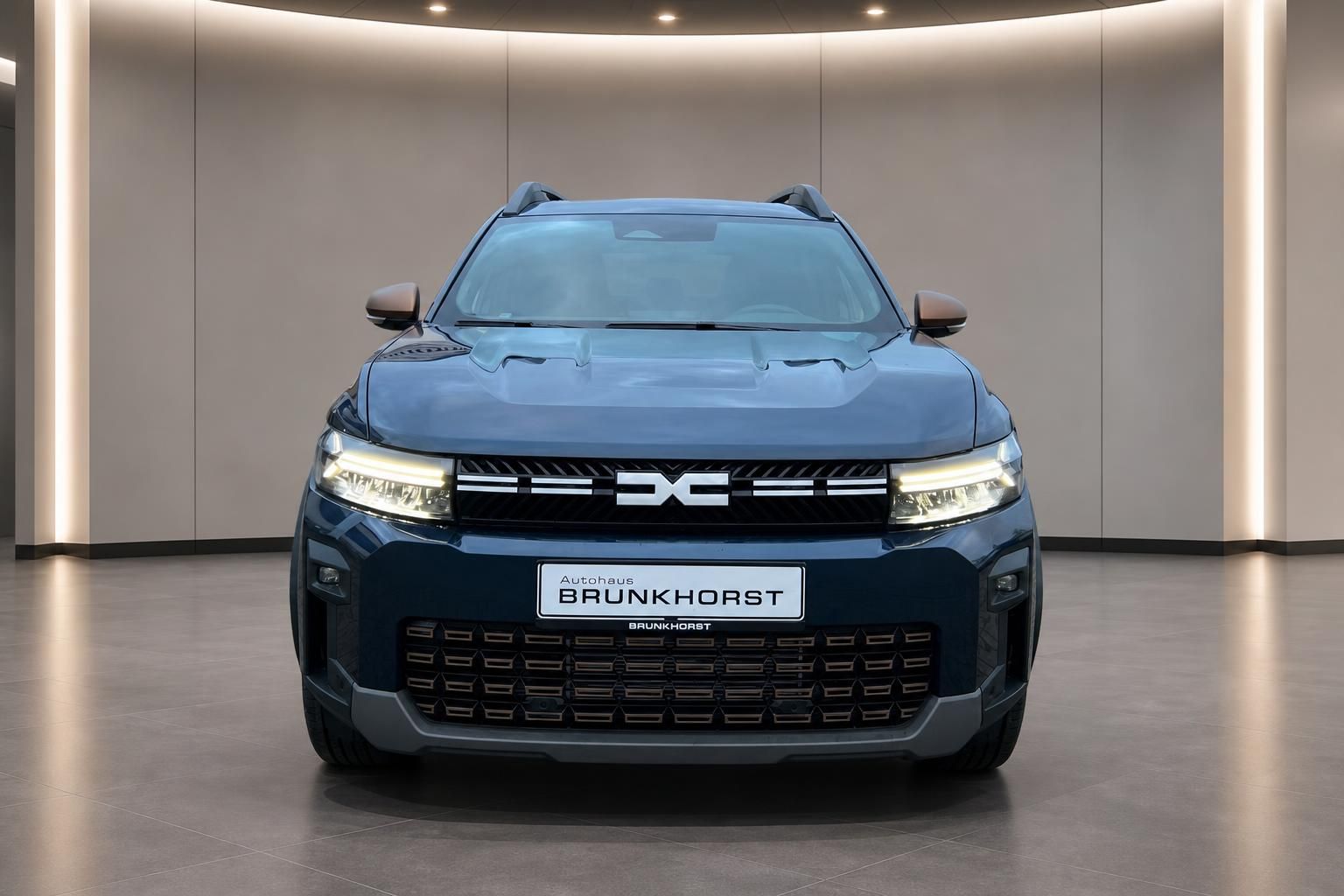 Dacia Bigster Frontansicht mit markantem Kühlergrill und LED-Scheinwerfern