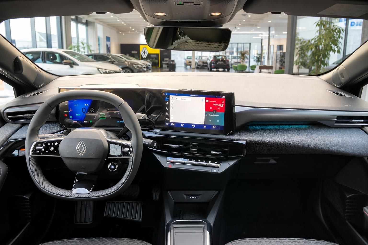 Renault Cockpit mit digitalem Kombiinstrument, großem Infotainment-Touchscreen und modernem Lenkrad
