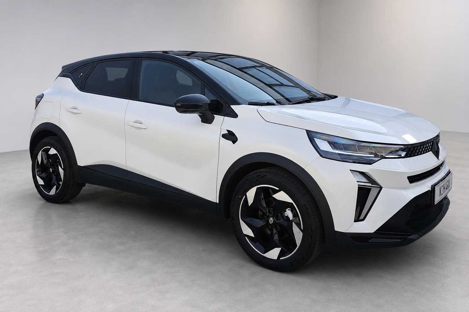 Renault Captur weiß mit Panoramadach, Seitenansicht schräg