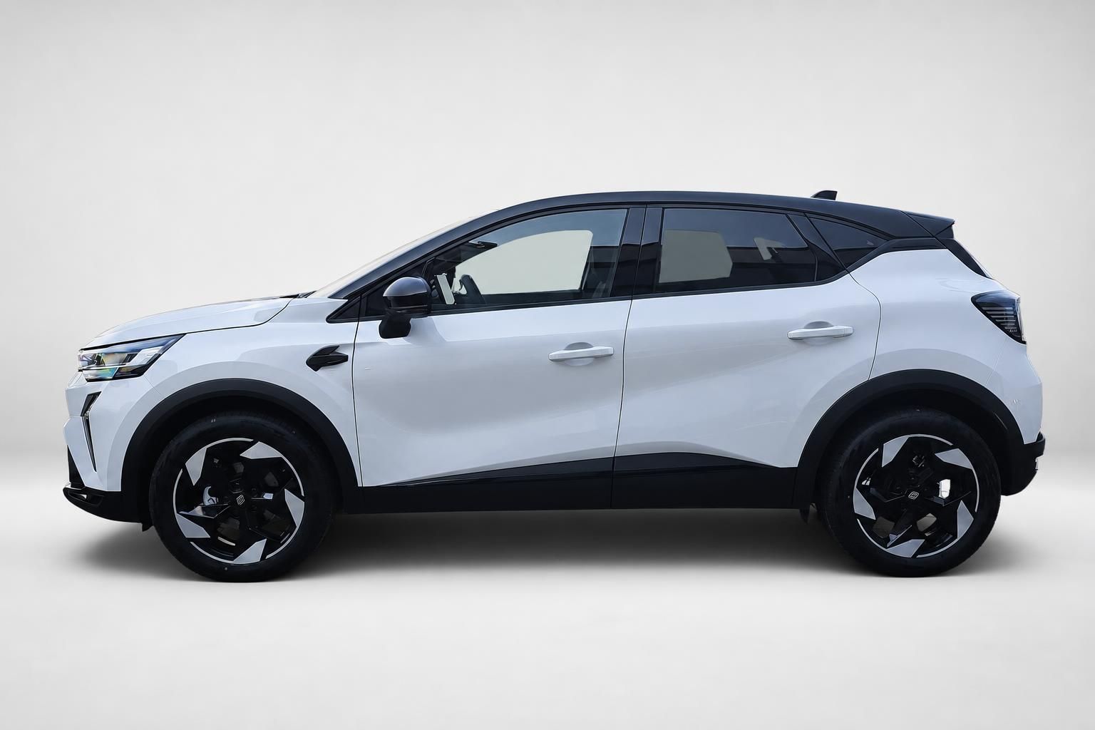 Renault Captur weiß in der Seitenansicht, Neuwagen Studiofoto