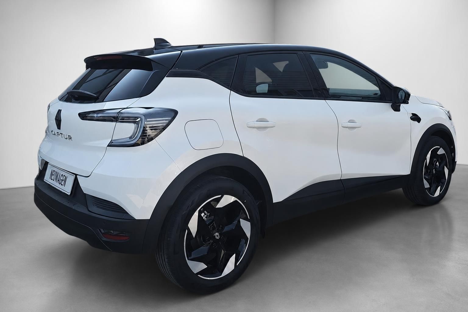 Renault Captur weiß Heck-Seitenansicht mit schwarzem Dach und Alufelgen