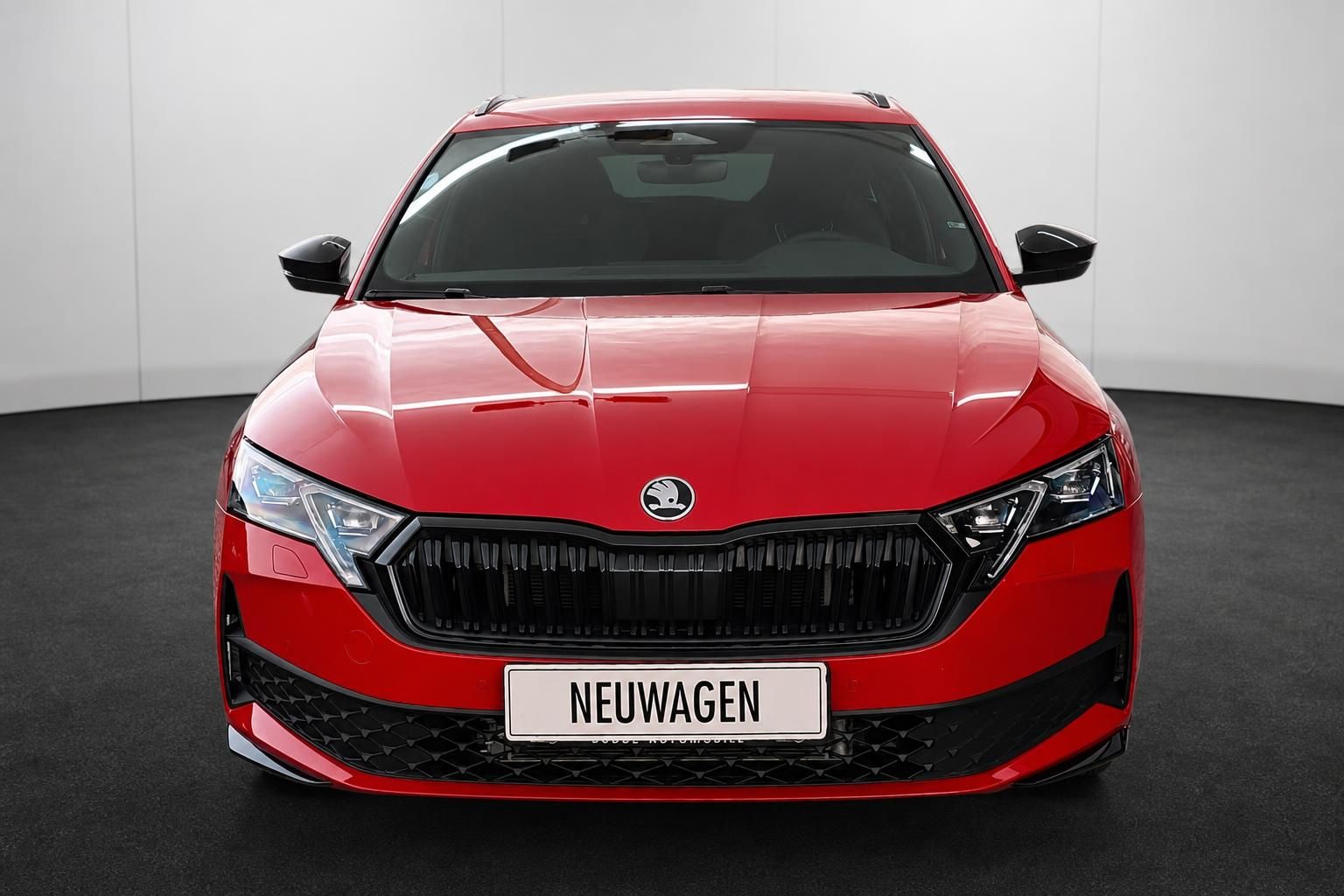 Skoda Neuwagen rot Frontansicht mit Kuehlergrill und LED-Scheinwerfern