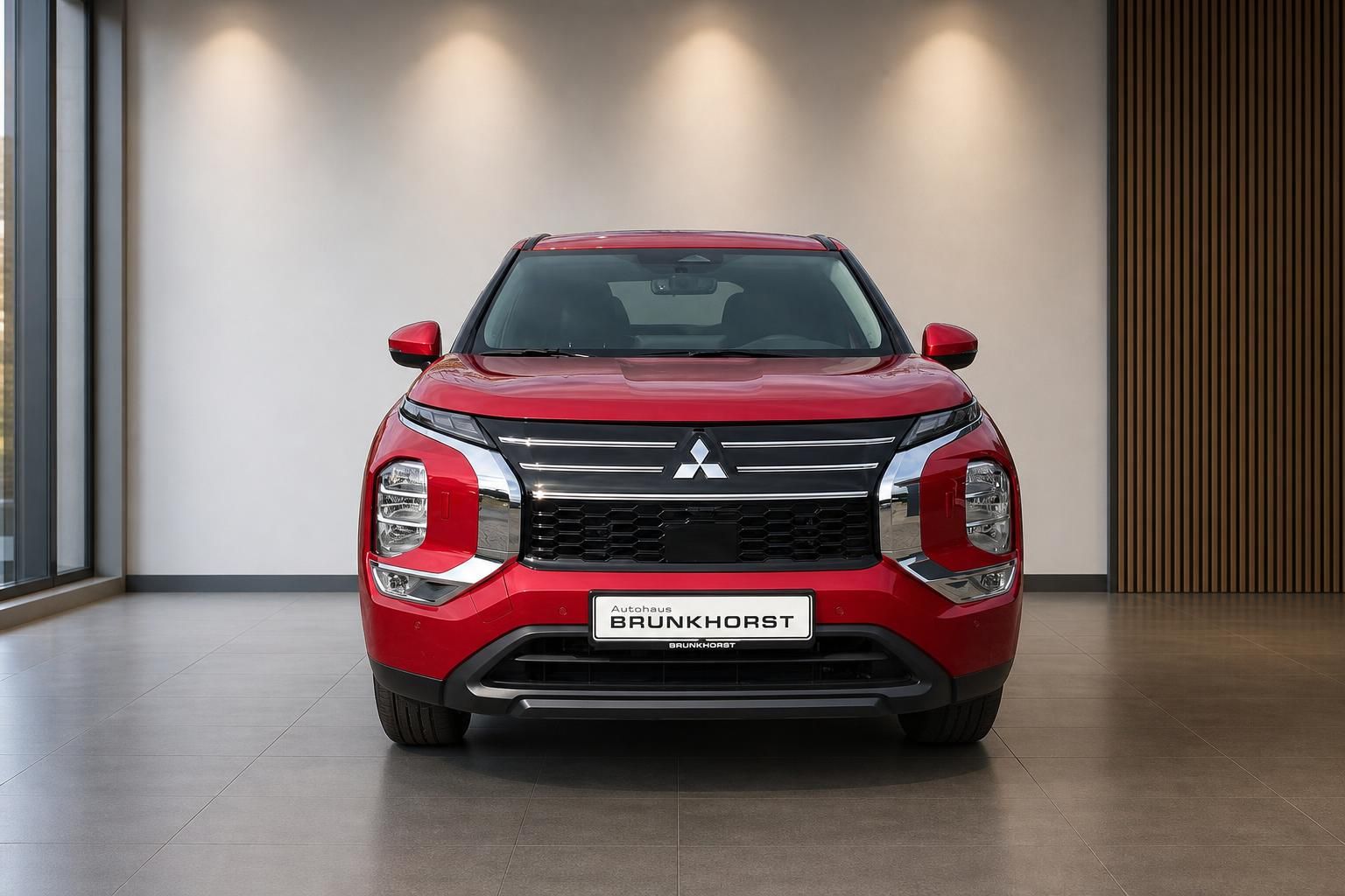 Roter Mitsubishi SUV Frontansicht - elegantes Design im Autohaus Brunkhorst