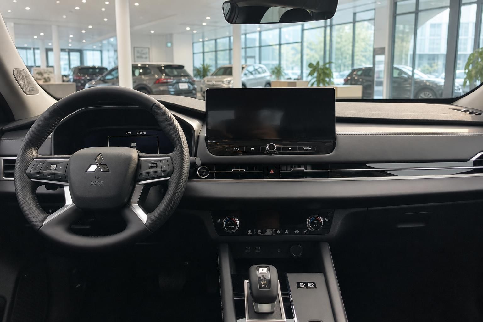 Mitsubishi Fahrzeug Innenraum - modernes Dashboard mit Touchscreen und Lenkrad