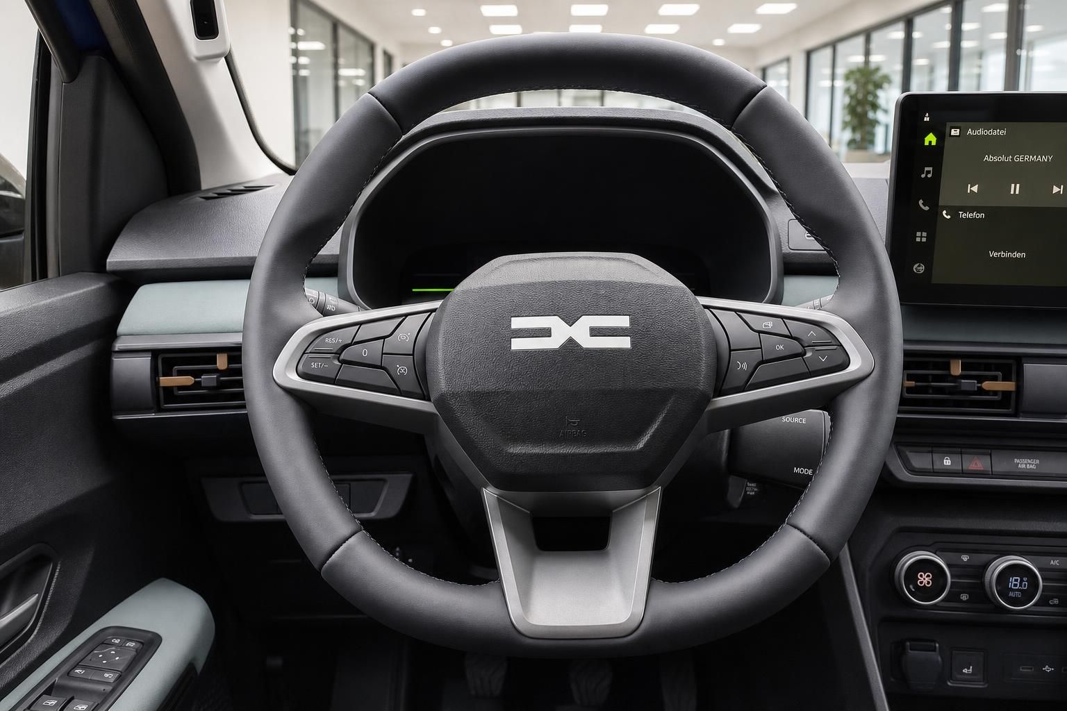 Dacia Lenkrad mit Multifunktionstasten und Infotainment-Display