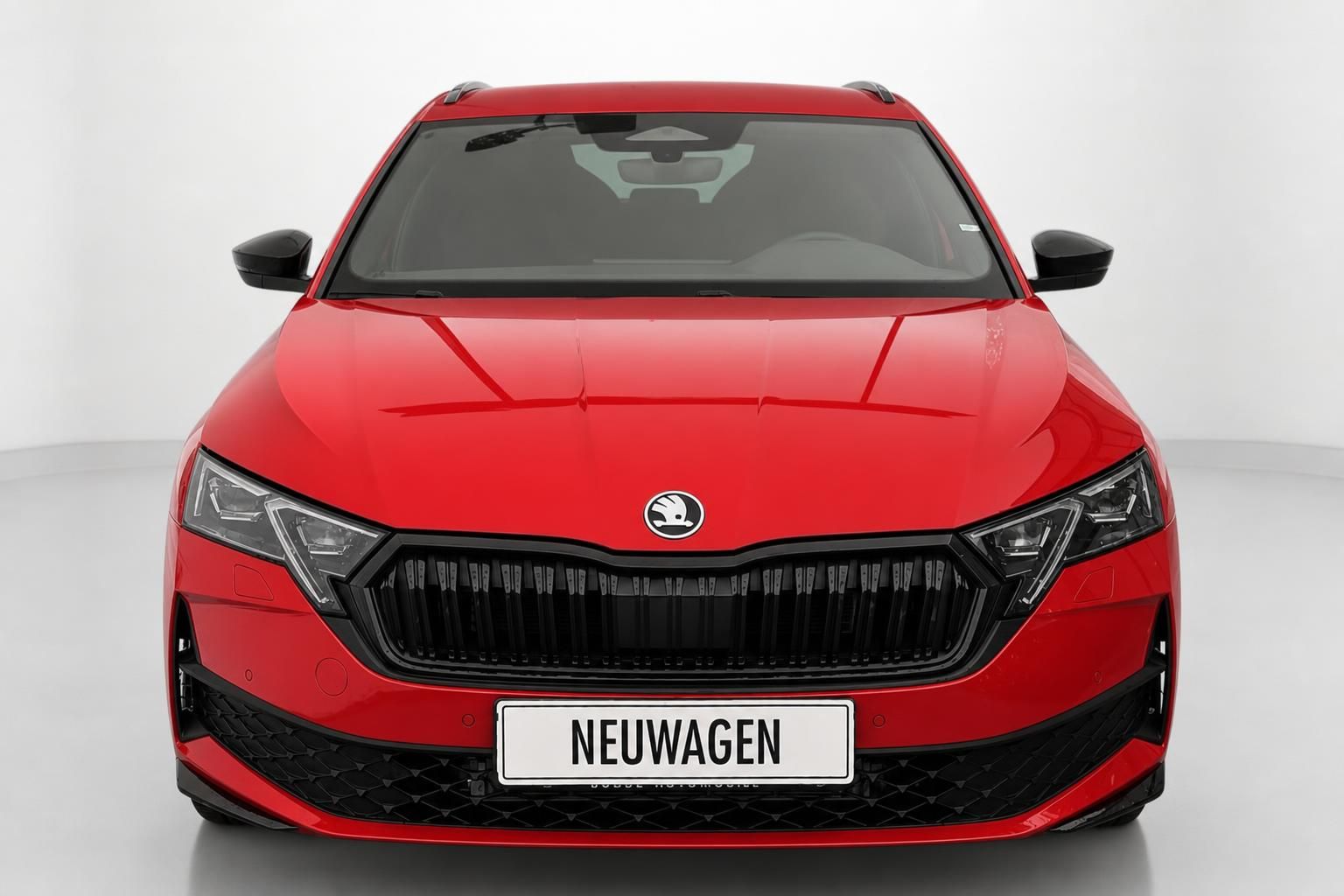Skoda Octavia Combi rot, direkte Frontansicht Kuehlergrill