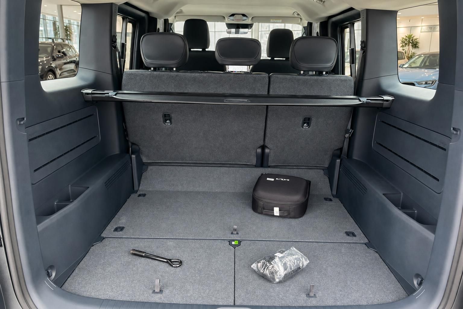 Kia PV5 Passenger Van, Kofferraum mit umgeklappten Sitzen