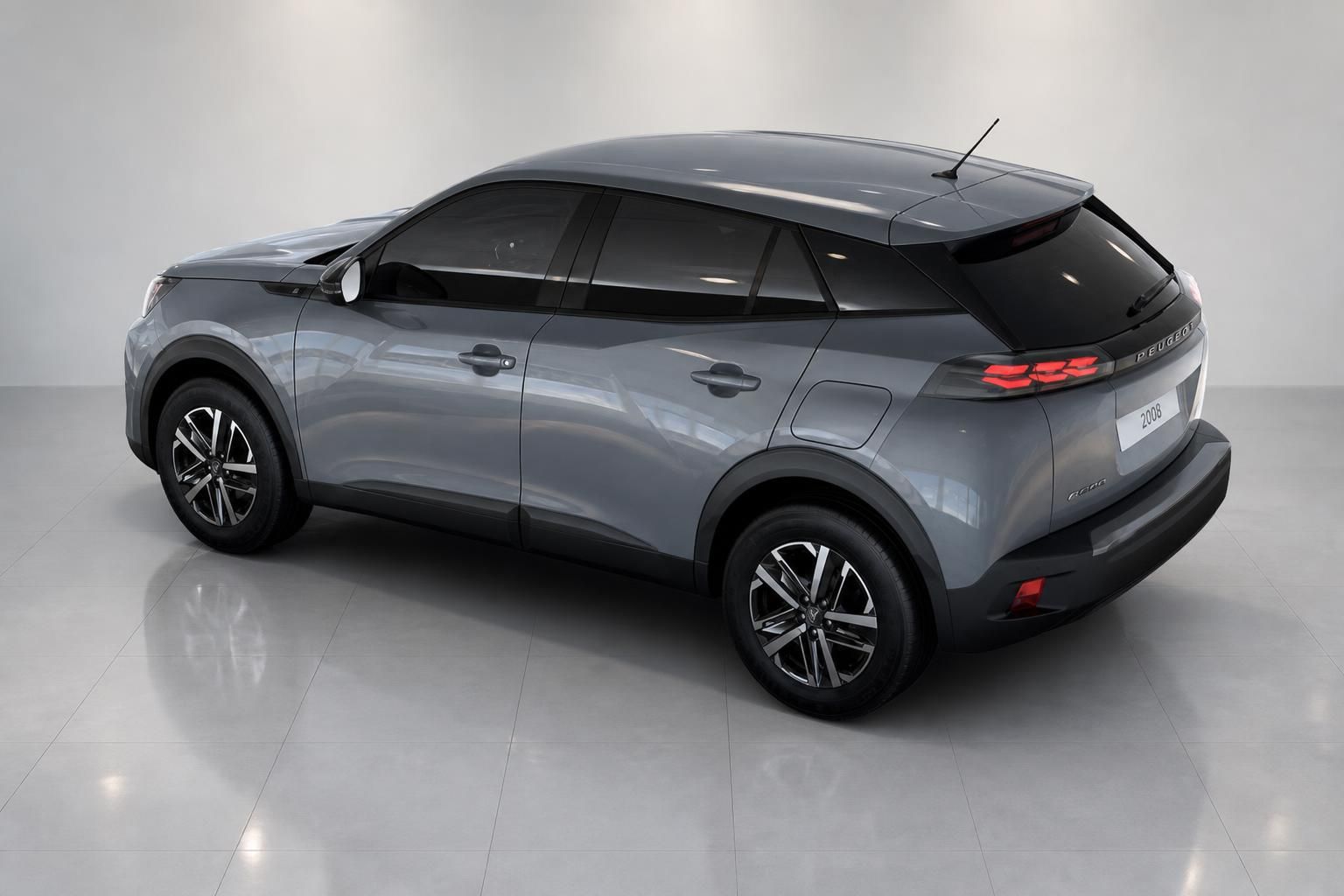 Peugeot 2008 grau Seiten-Heckansicht von oben im Studio