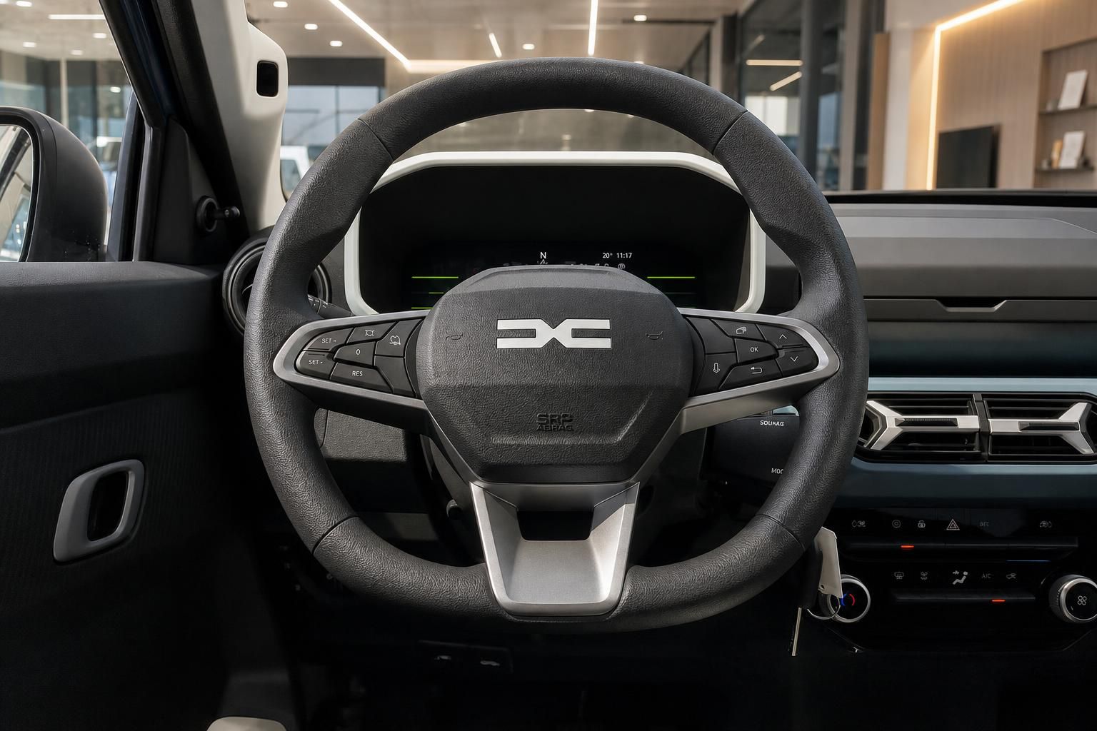 Dacia Lenkrad mit Multifunktionstasten und digitalem Cockpit im Innenraum