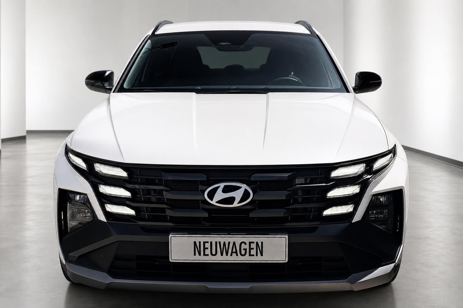 Hyundai Tucson weiß Frontansicht mit Kühlergrill und LED-Licht