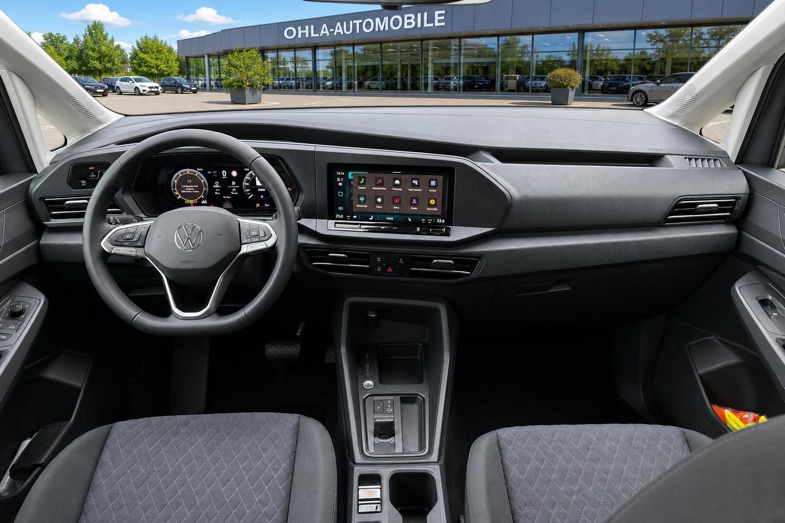 VW Innenraum mit Armaturenbrett und Infotainment-Display