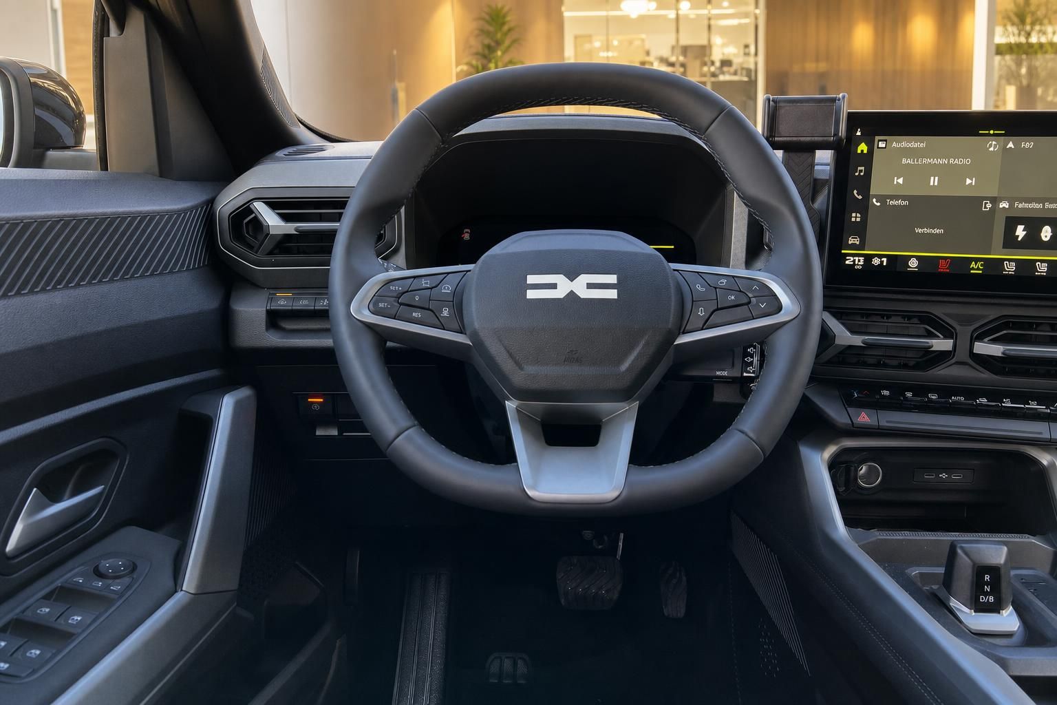 Fahrzeug Innenraum mit Lenkrad und Infotainment-Display - moderne Ausstattung