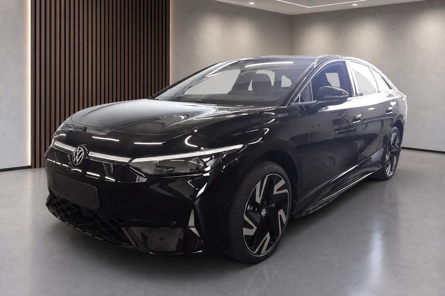 VW Limousine schwarz, Frontansicht mit Alufelgen im Showroom