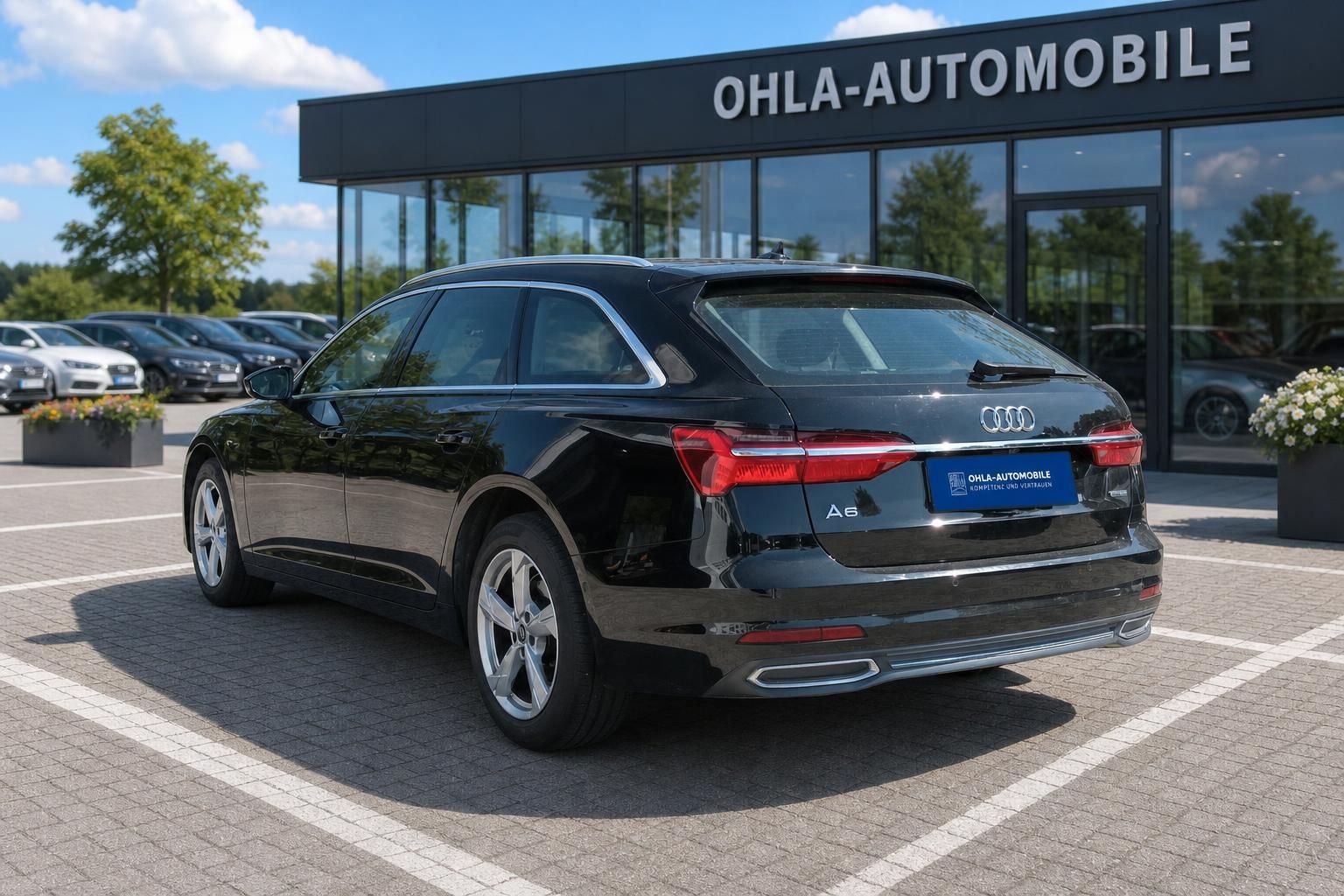 Audi A6 Avant schwarz Seitenansicht hinten OHLA-Automobile