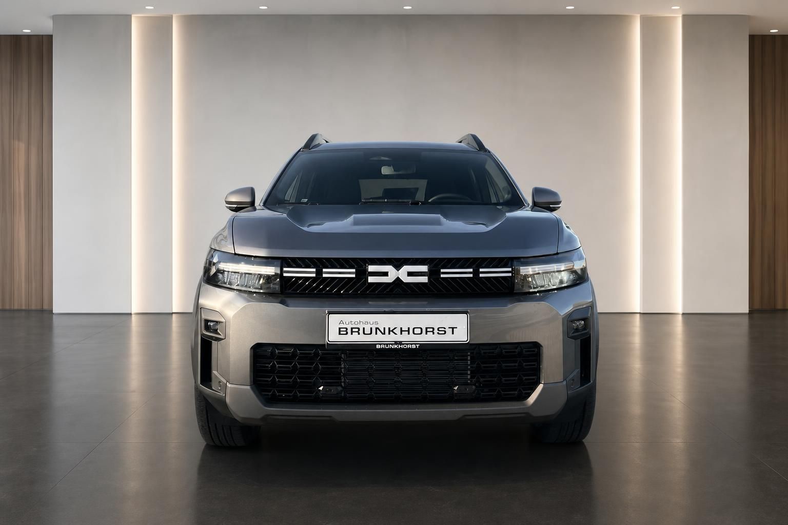Dacia Bigster Frontansicht direkter Blick schwarzer Kühlergrill LED-Scheinwerfer