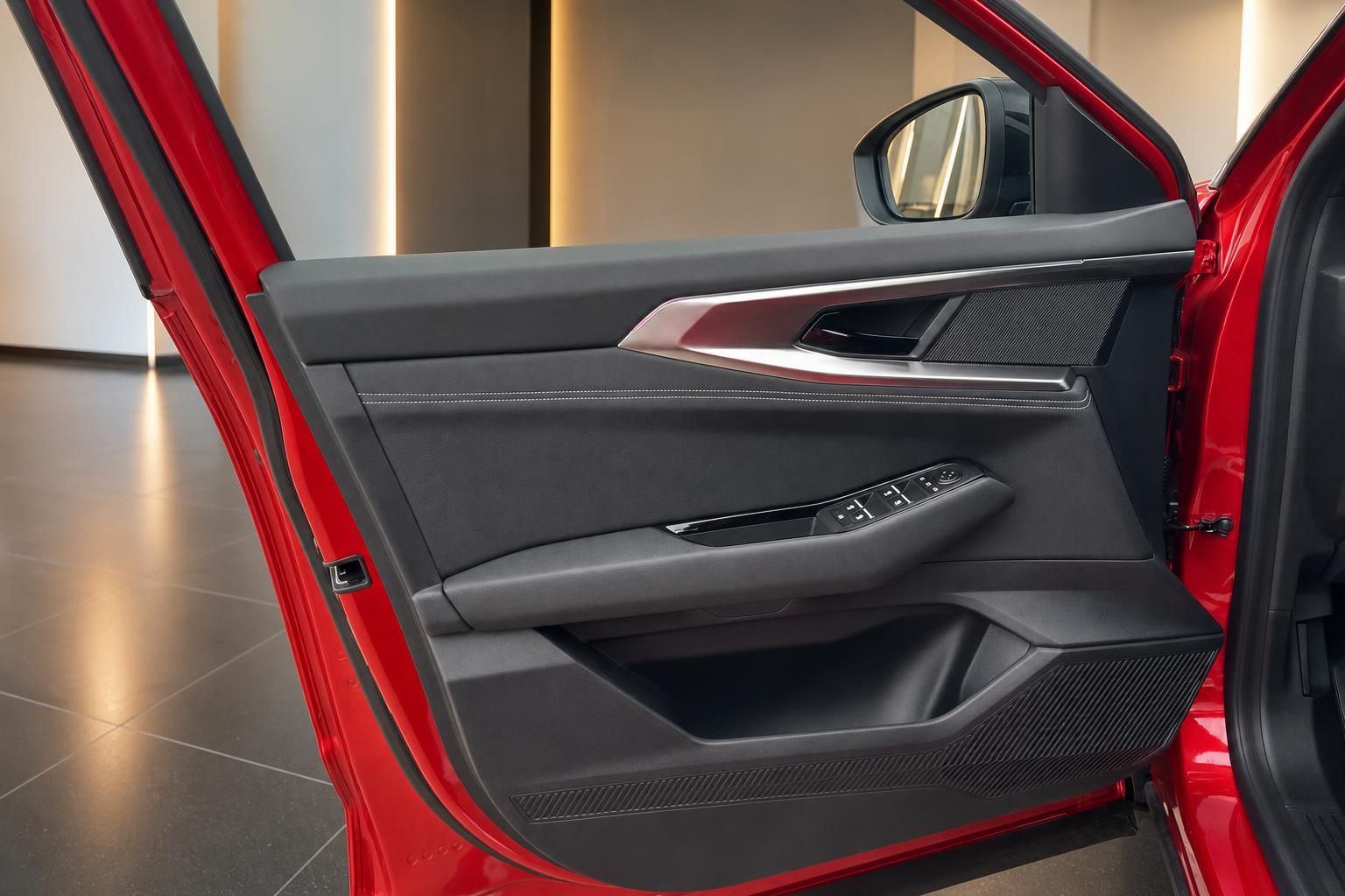 Renault Türverkleidung mit Fensterheberschaltern und roter Akzentbeleuchtung - Innenraumdetail