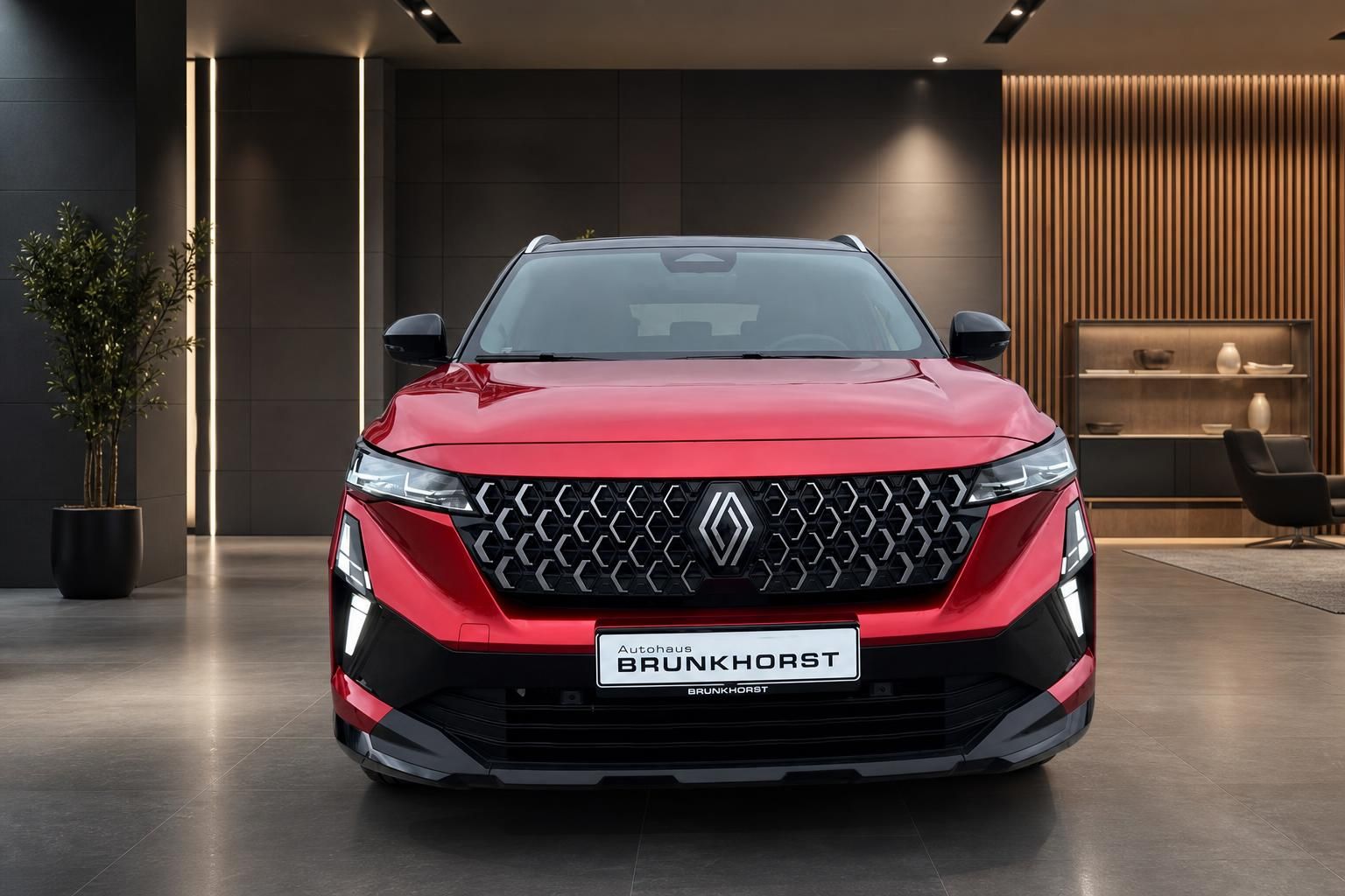 Roter Renault Austral SUV Frontansicht mit BRUNKHORST Kennzeichen im modernen Showroom