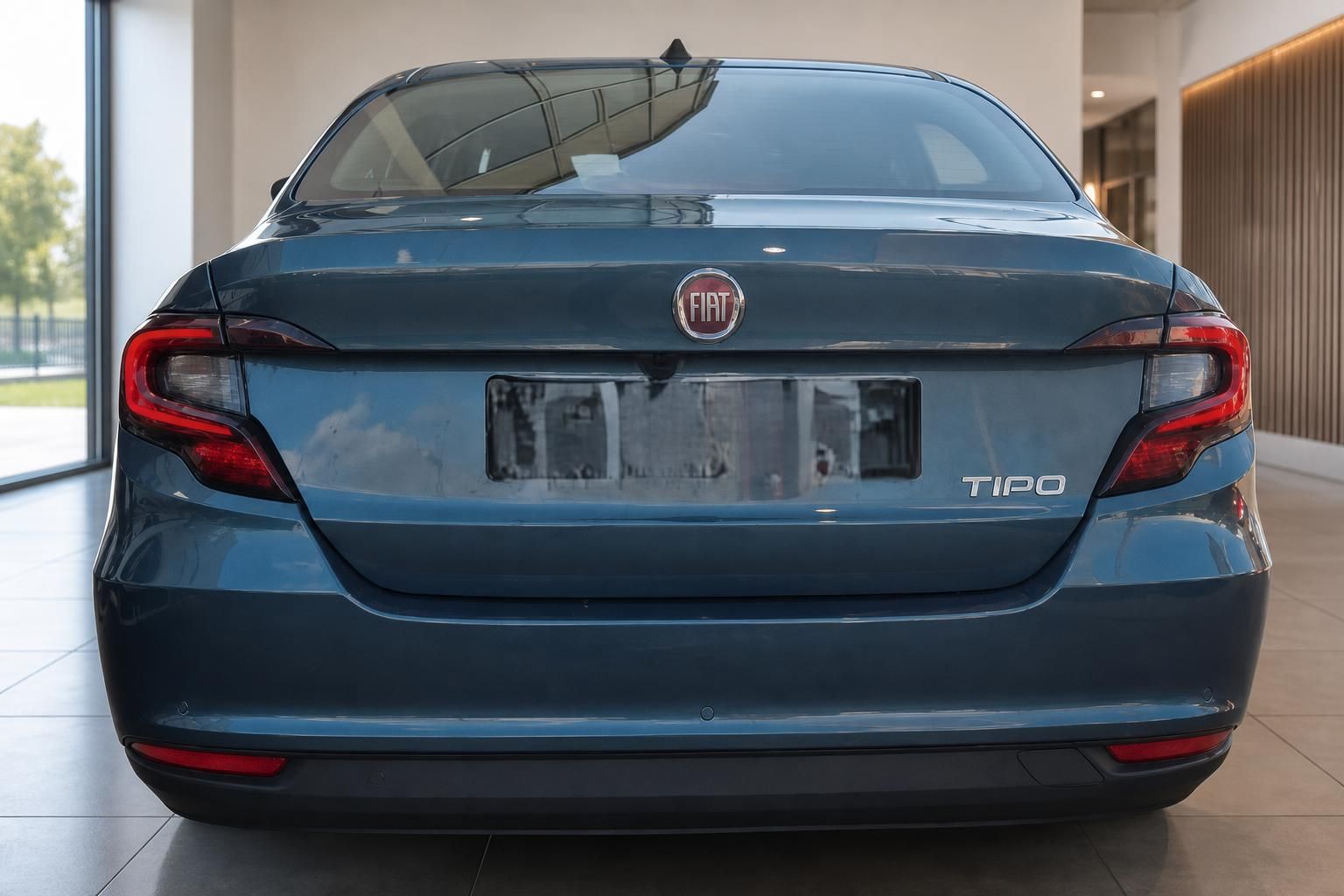 Fiat Tipo blau metallic Heckansicht frontal mit TIPO Schriftzug