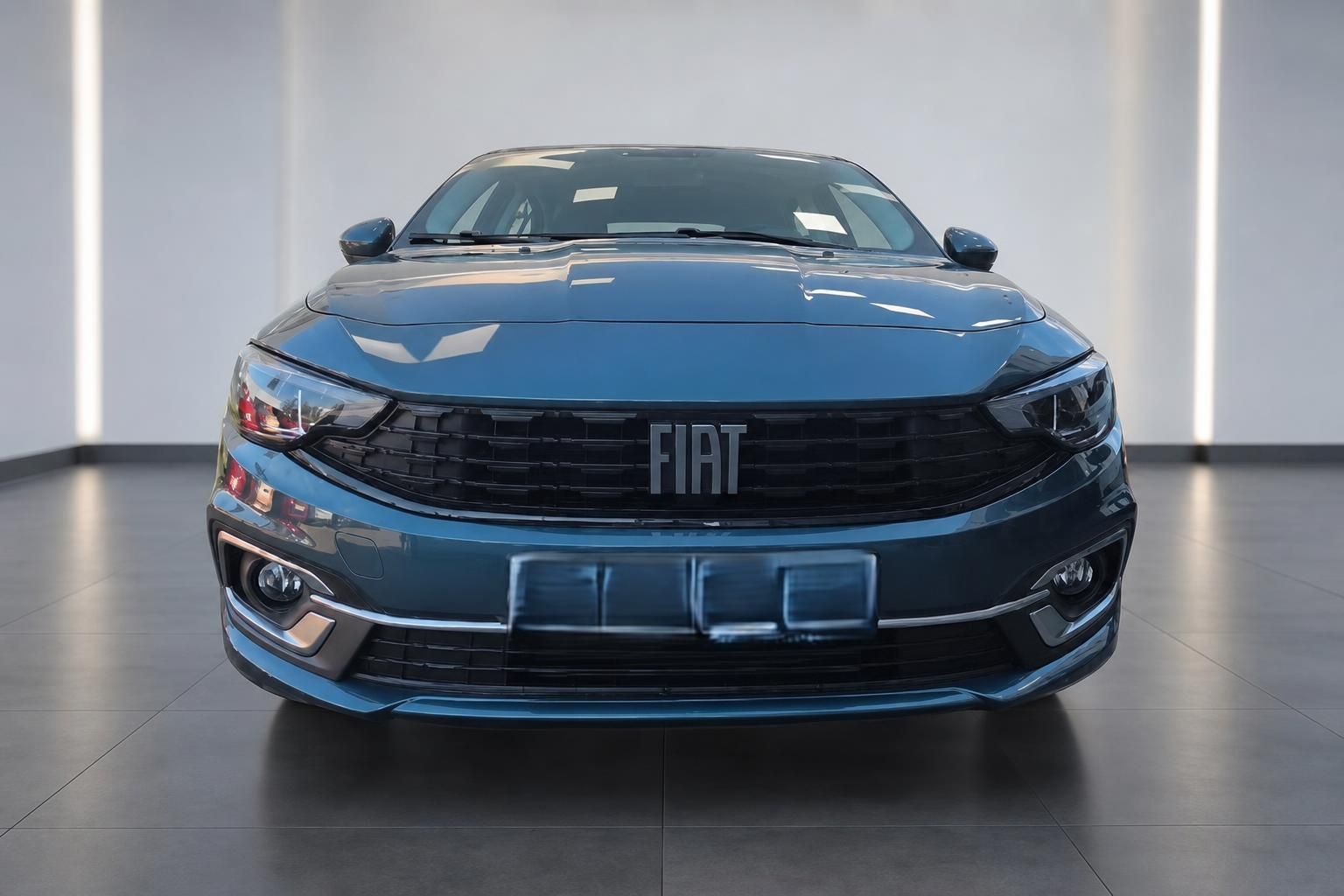 Fiat Limousine Frontansicht in blau mit schwarzem Kühlergrill und LED-Scheinwerfern