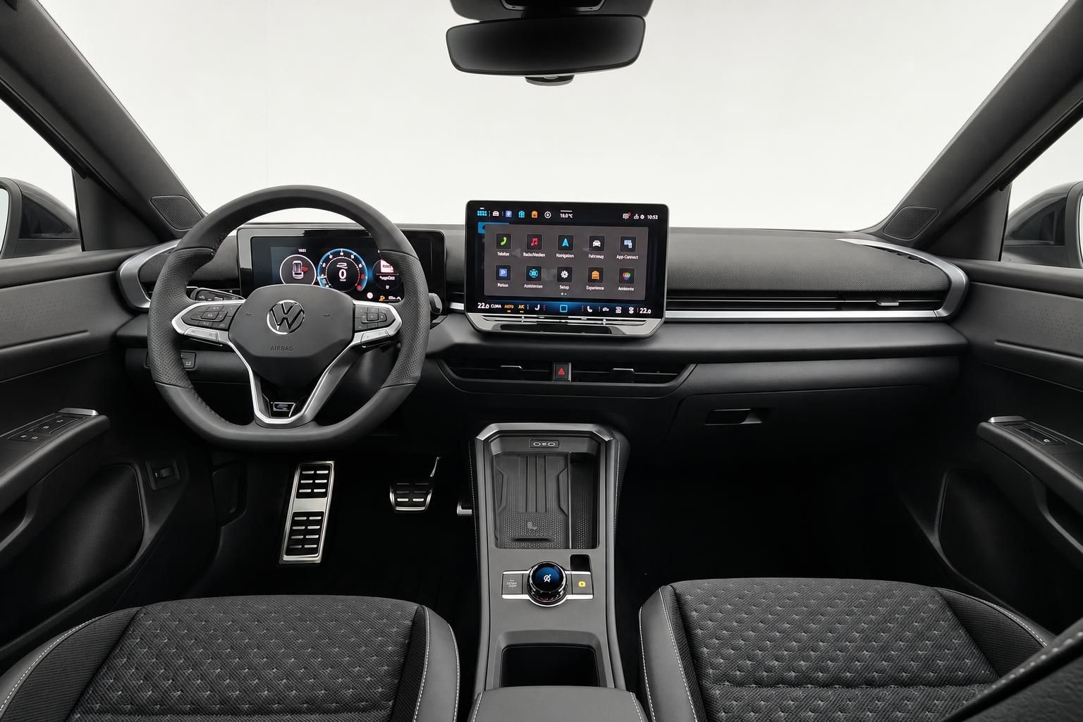 VW Cockpit mit Lenkrad und Infotainment-Display im Detail