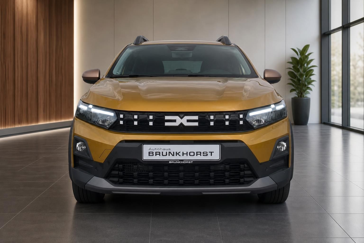 Dacia Sandero Stepway gelb, Frontansicht mit LED-Scheinwerfern