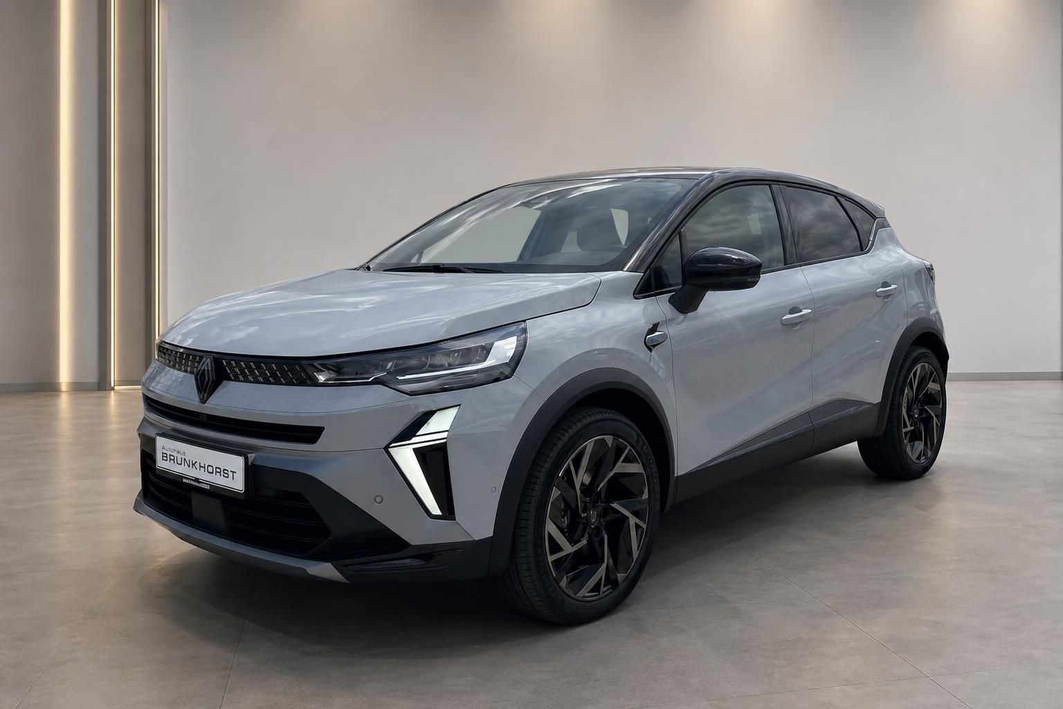 Renault Captur SUV in grau - Seitenansicht mit modernem Design und Leichtmetallfelgen