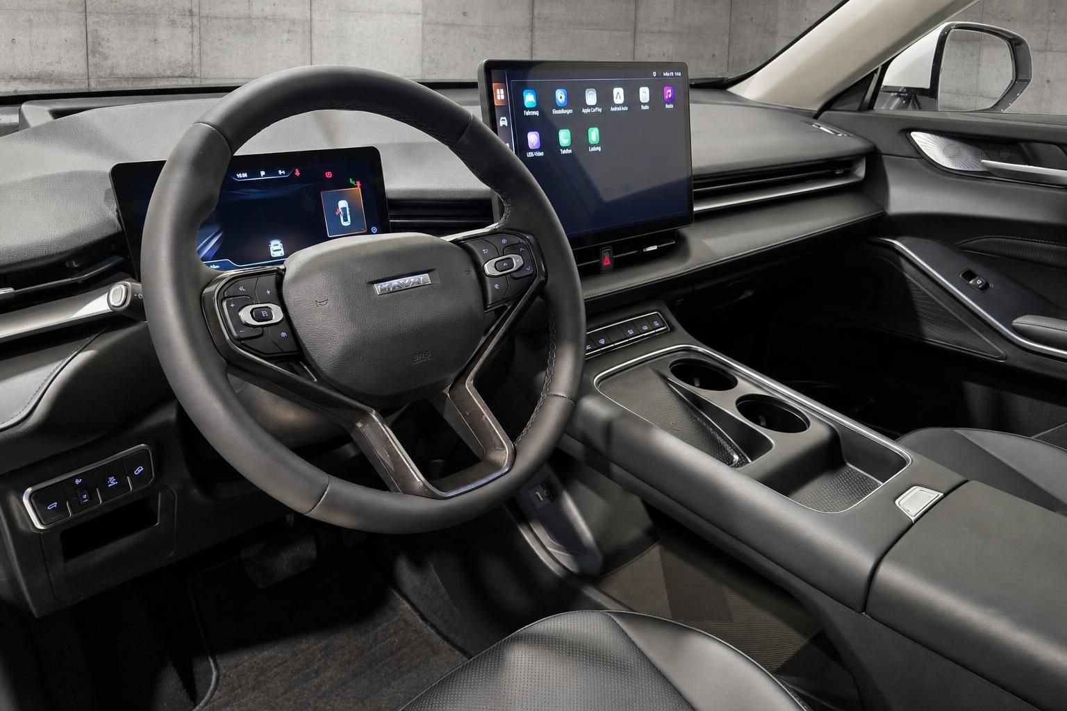 Haval Innenraum mit Lenkrad, Digitalcockpit und Touchscreen-Infotainment