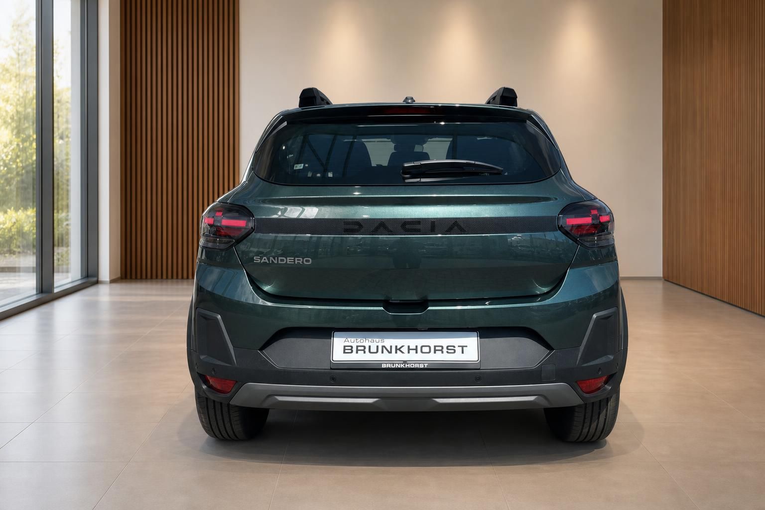 Dacia Sandero Stepway Heckansicht in Grün - Kompakt-SUV mit Autohaus Brunkhorst Kennzeichen