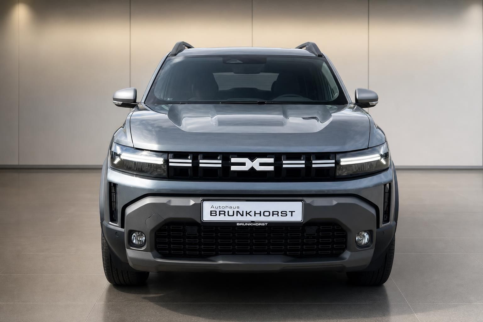Dacia Duster Frontansicht grau metallic im Autohaus