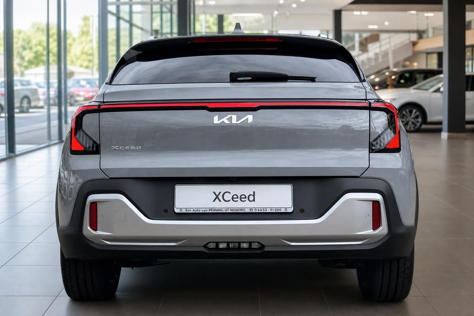 Kia XCeed Heckansicht in Grau beim Autohaus